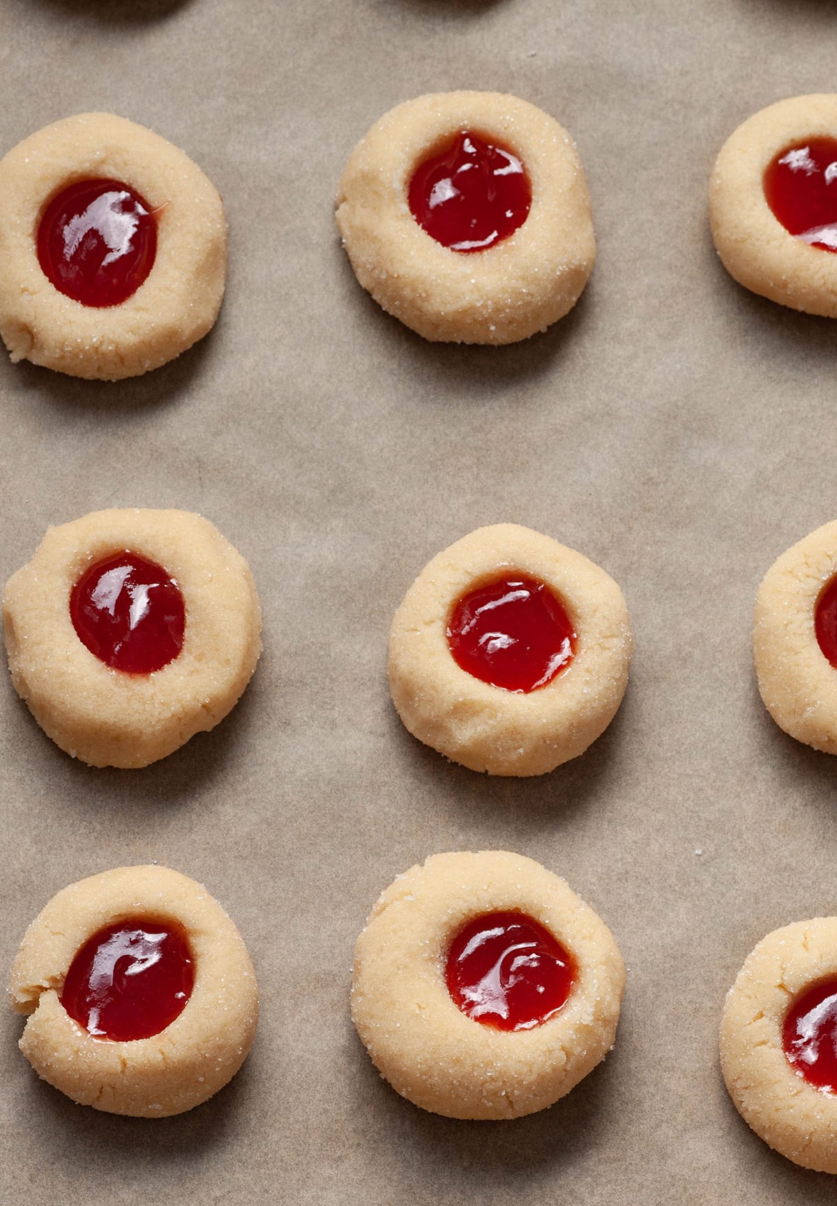 Thumbprint cookies with raspberry filling on bakin shr