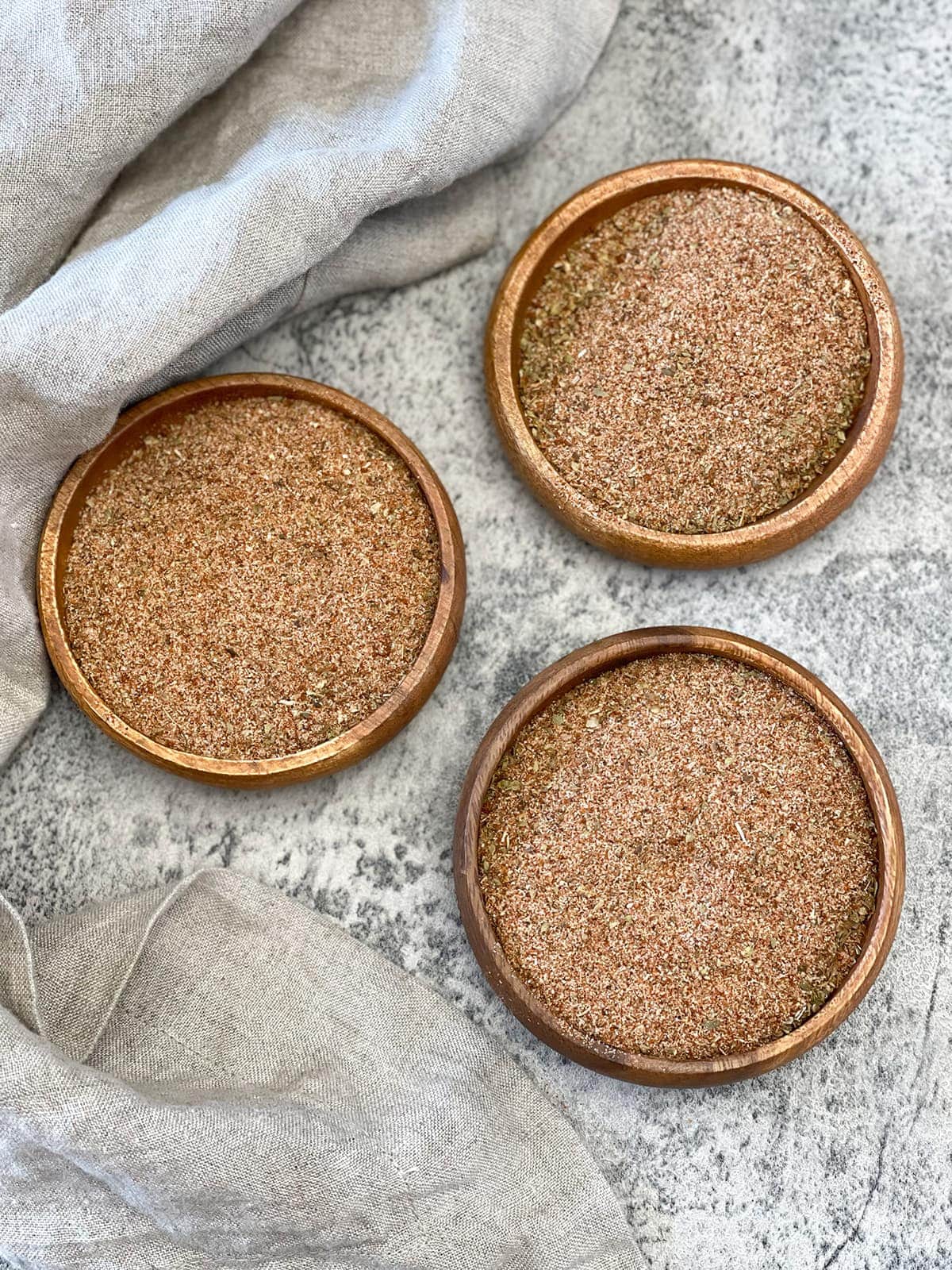 Adobo Seasoning in a wooden bowl