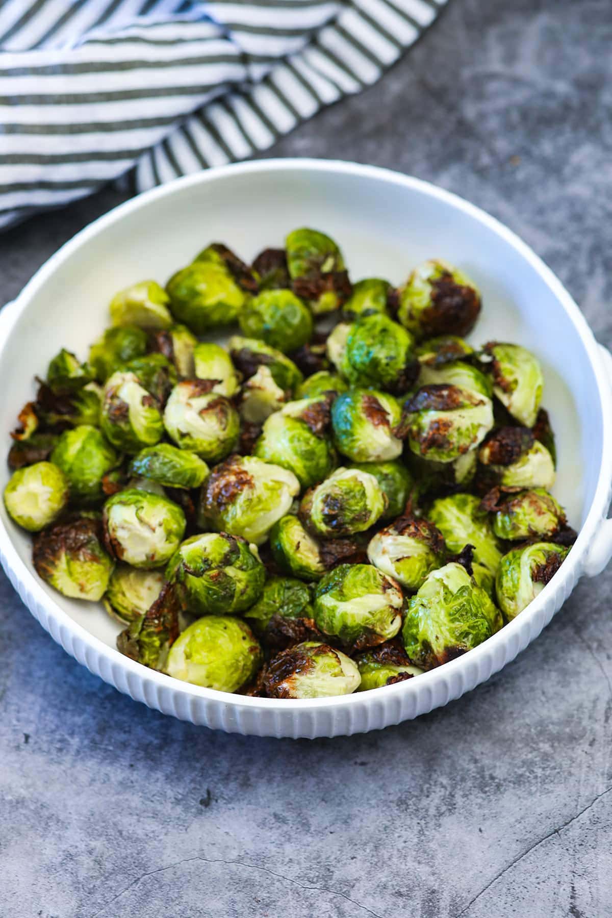 Air Fryer Brussels Sprouts in a white bowl