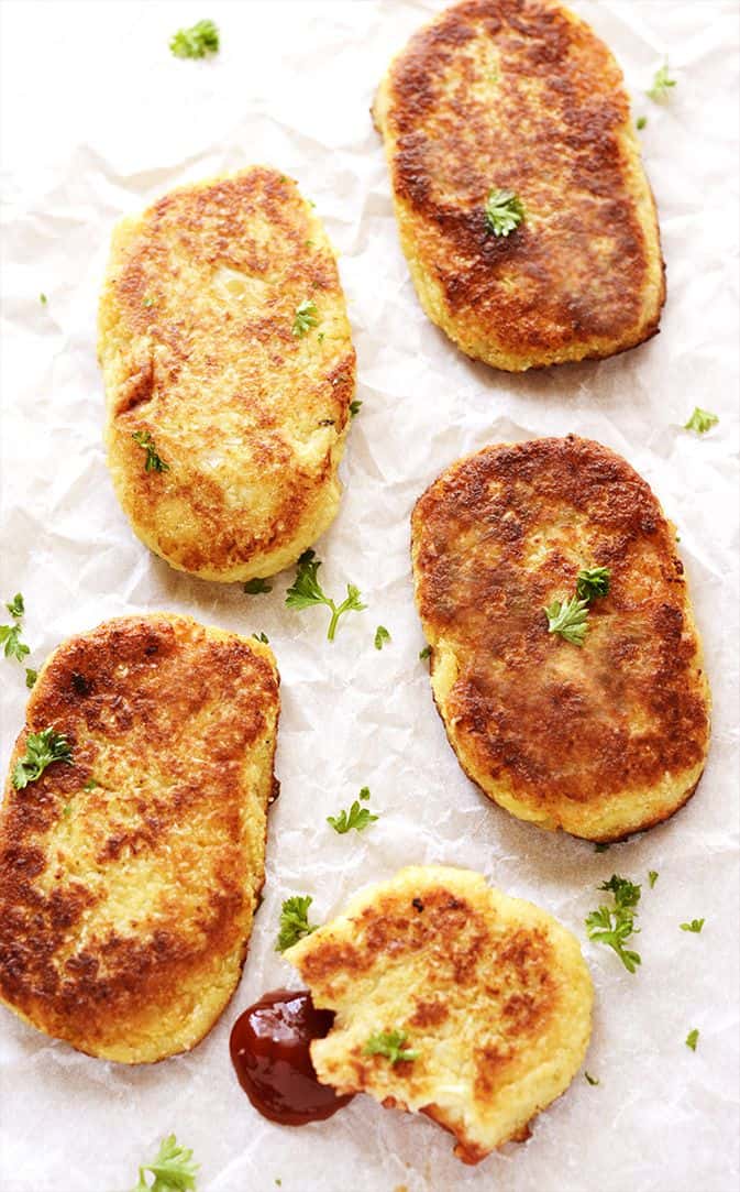 Gluten-Free Vegan Cauliflower Hash Browns on a white baackground