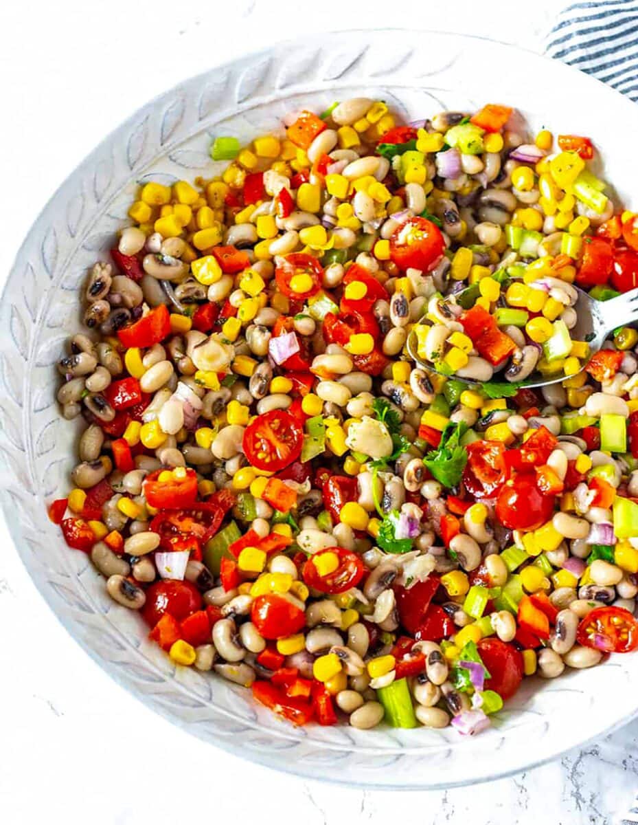 cowboy caviar recipe in white bowl on white background