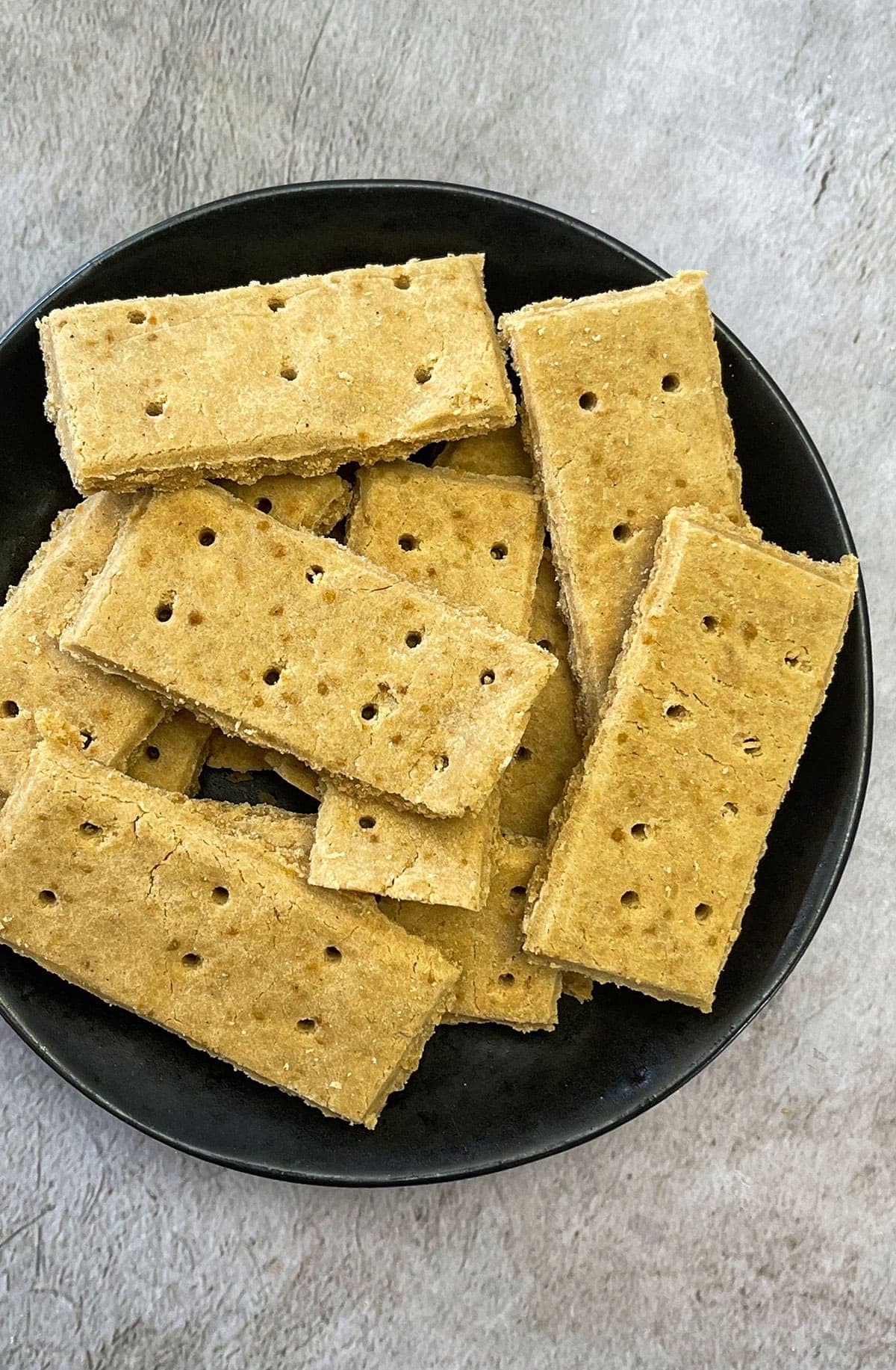 Gluten-Free Graham Crackers on a black bowl