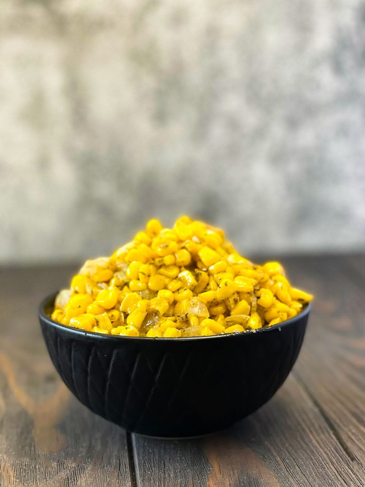 Corn on a black bowl