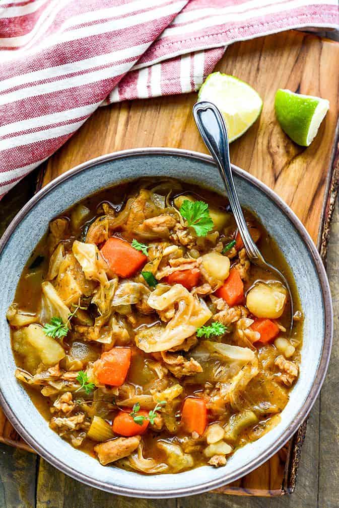 Ital Stew on a clay bowl on wooden background