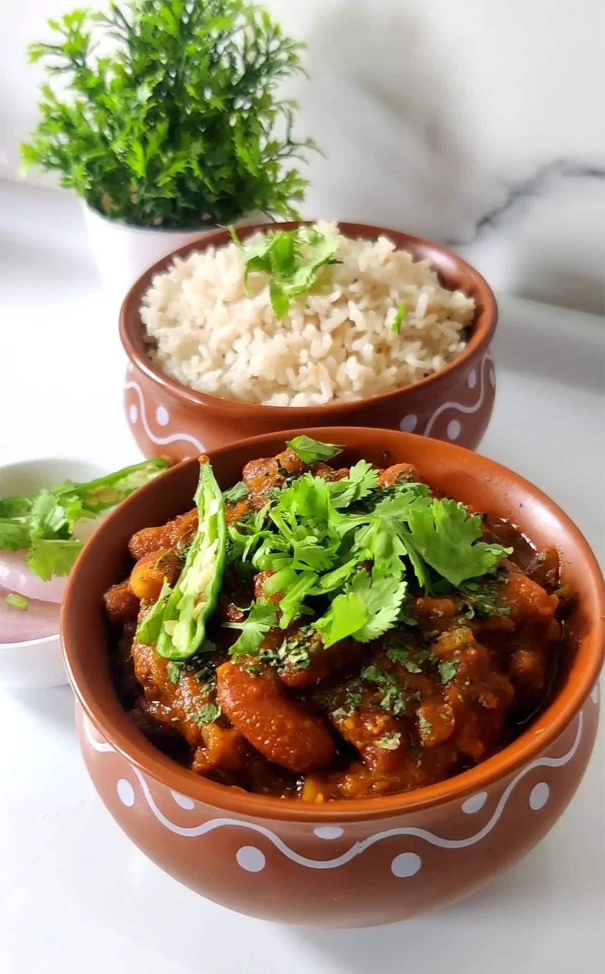 Rajma Chawal on clay bowl on white background