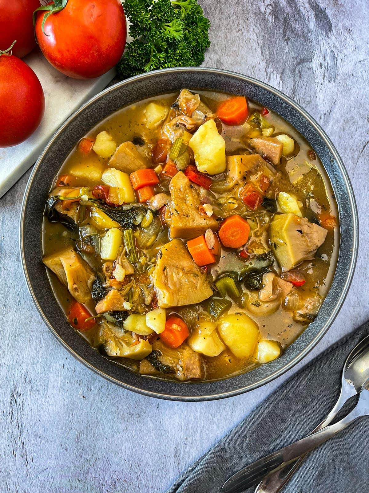 Vegan Jackfruit Stew in grey bowl