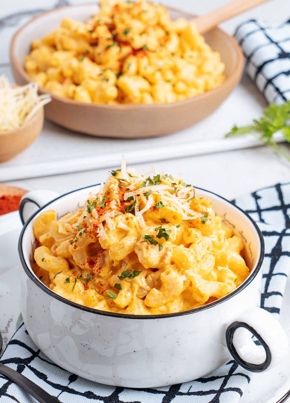 vegan mac & cheese recipe on white bowl on white background