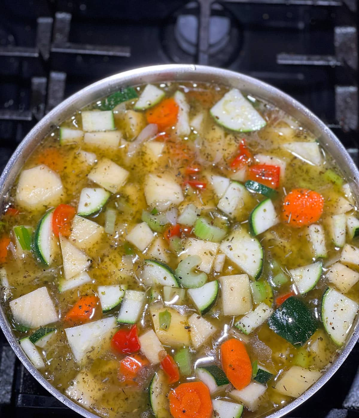 Cooking kohlrabi stew in a saucepan