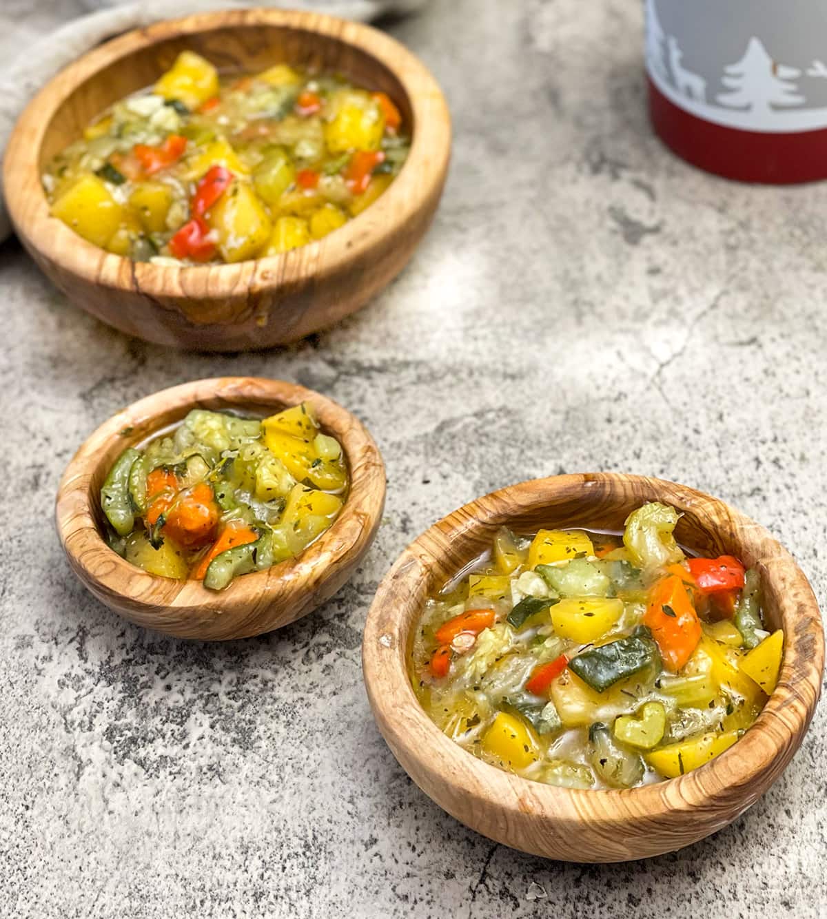 kohlrabi stew in 3 wooden bowls