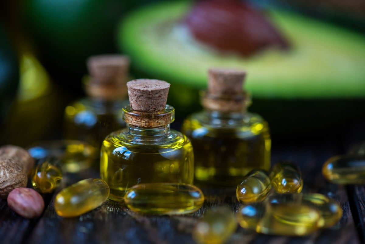 omega 3 oil supplements on black background