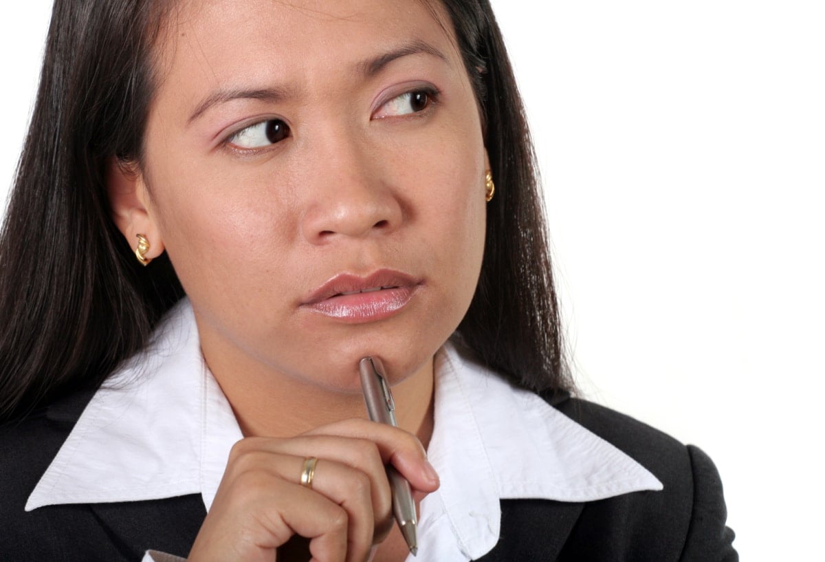 photo of an asian business woman thinking