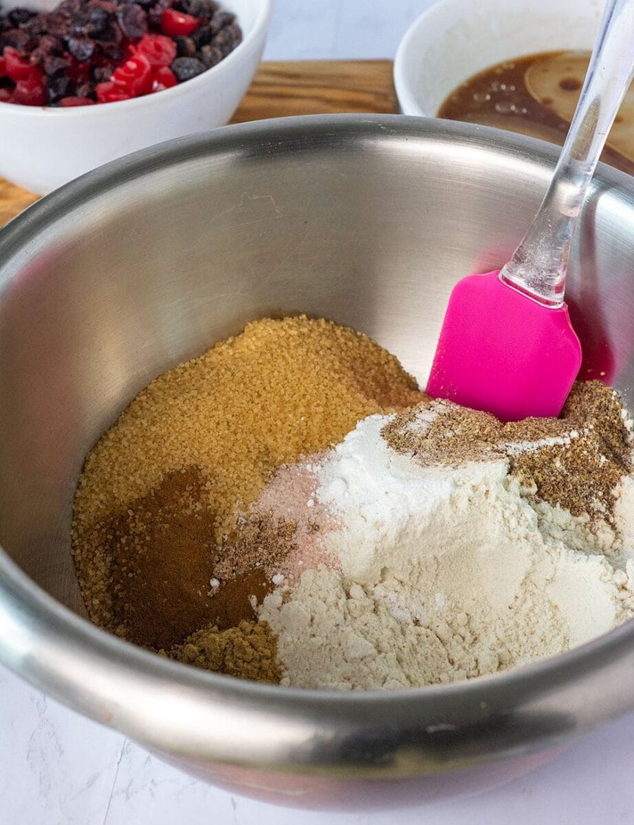 ingredients for Jamaican spice bun in a stainless steel bowl
