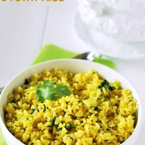 Lemon Cilantro Brown Rice in white bowl on white background